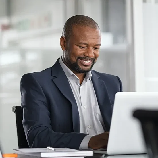 Man working on a laptop.